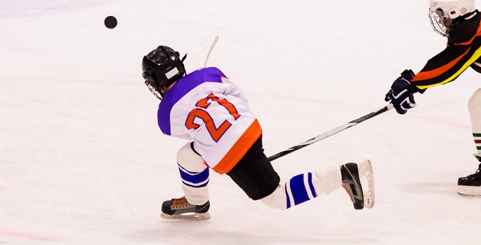 Hockey player taking a slap shot