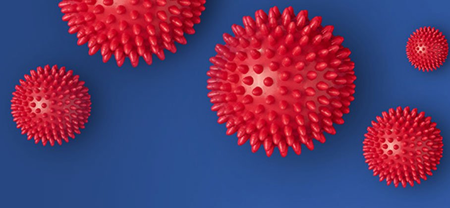 blue background with pink spikey balls on it